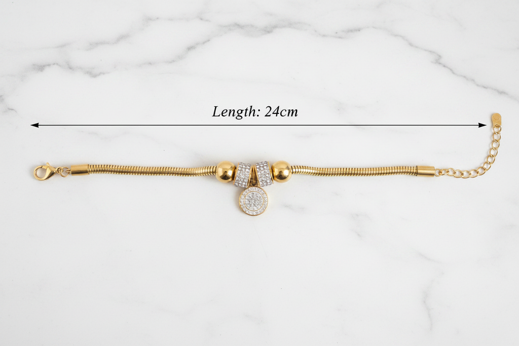 18K gold plated crystal charm snake chain bracelet laid flat showing full length of 24cm — Bangle Bangle