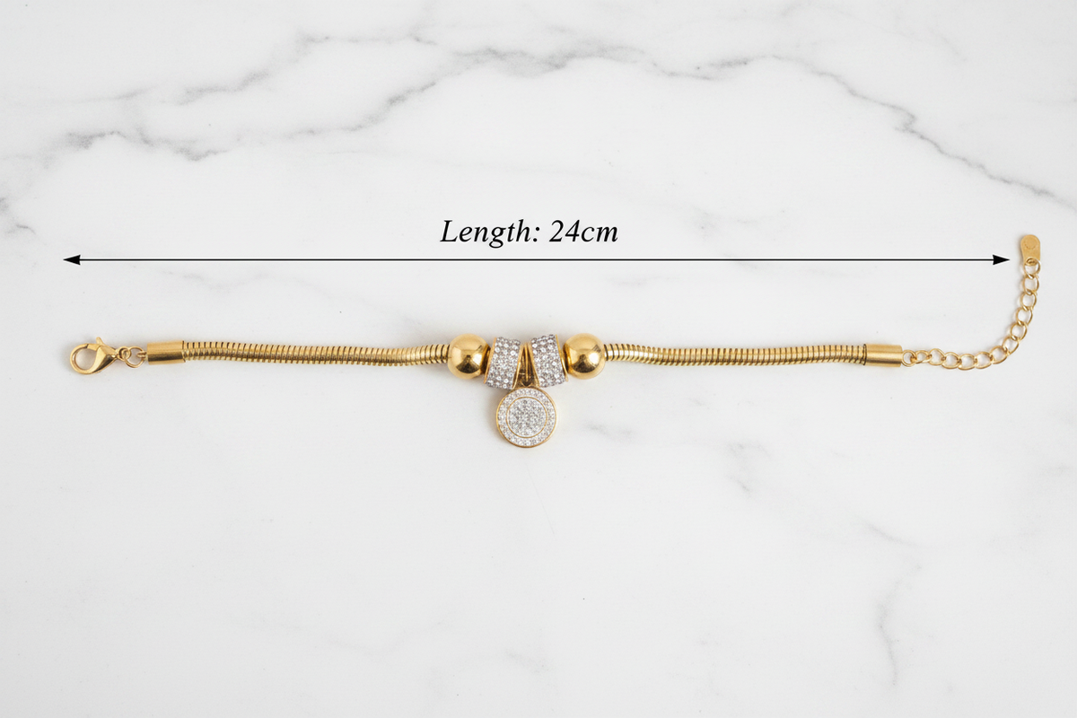 18K gold plated crystal charm snake chain bracelet laid flat showing full length of 24cm — Bangle Bangle