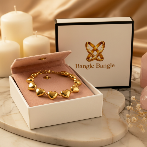 Puffy Heart Chain Bracelet  sat on a pink pouch in the Bangle Bangle gift box