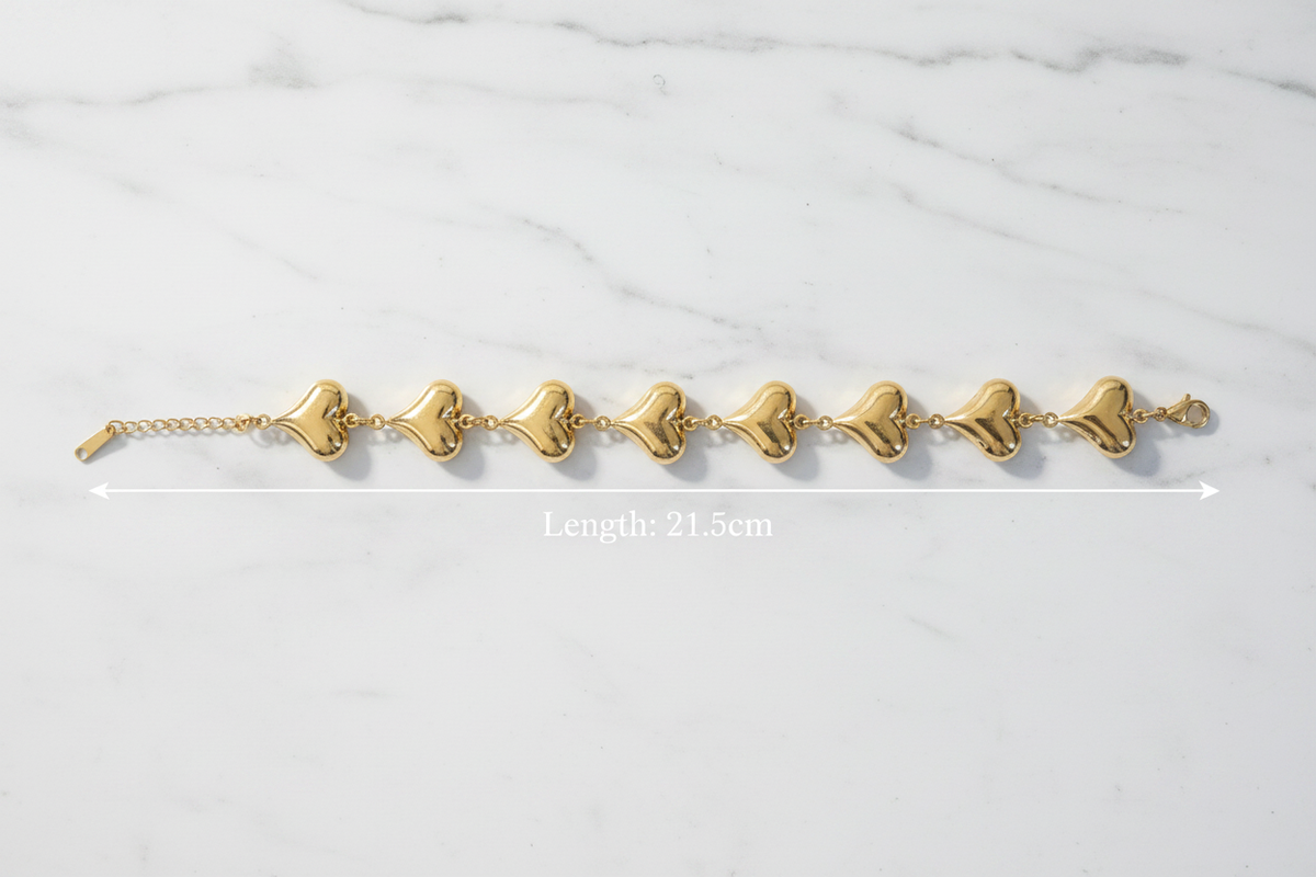 18K gold plated puffy heart chain bracelet laid flat showing full length of 21.5cm — Bangle Bangle